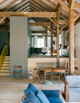 Living Room and Chair #interior #wood #modernrustic #barn #rustic #livingroom #bedroom #loft  Photo 4 of 11 in Make Your Space Look Bigger: 10 Lofted Bedrooms from Interiors