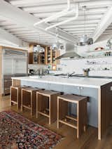 #interior #modern #inside #design #interiordesign #wood #kitchen #barstools #hoodvent #stove #cabinets #arearug #shelving #fridge #stainlesssteel #sanfrancisco #henrybuilt 