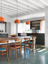 #interior #dining #modern #table #diningarea  #lucymarston #diningroom #pendantlight #color #orange #hodgson&baker #antiques #ceramicpendantlight #hand&eyestudio #architect #woodchair #kitchen #openfloorplan #sink #cabinets 