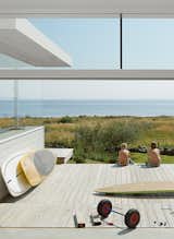 #beachhouses #exterior #outside #landscape #glass #surfboard #ArkitektstudioWidjedalRacki #Sweden
