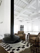 #interior #fireplace #modern #livingroom #seatingarea #ergofocus #leatherarmchairs #arearug #navone #baxter #whitewall #secondfloor