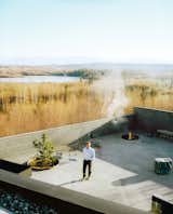#exterior #fireplace #modern #indooroutdoor #courtyard #firepit #infinitypond #livingarea #outdoors #cedarcabin #cabin #alaska 