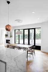 #interior #dining #modern #table #diningroom #wood #diningtable #indoor #Wishbone #chairs #Montreal #Canada #ArchitectureOpenForm #MaximeMoreau   Photo 7 of 18 in In the Home by Carl Hansen & Søn from Favorites
