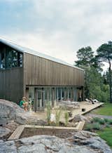 #prefab #modern #structure #shape #form #exterior #outside #outdoors #landscape #deck #seating #view #PlusHouse #Arkitekhus #Swedish
