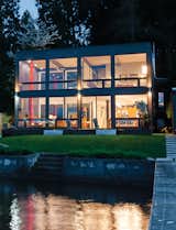 #beachhouses #exterior #outside #outdoors #modern #midcentury #landscape #windows #lighting #lake #Seattle #TheAquaLair #SchemataWorkshopInc. #BlipDesign
