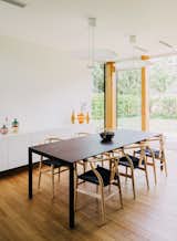 #interior #dining #modern #modernarchitecture #table #diningroom #wood #diningtable #indoor #HansWegner #Wishbone #chairs #PieroLissoni #Padua #Italy #Studiopietropoli