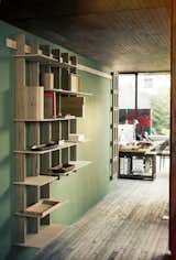 #storage #modern #interiordesign #pendantlibrary #argentine #net #color #shelving #books #bookshelf 
  Photo 1 of 1 in Shelves by Mel Cahoon from Favorites