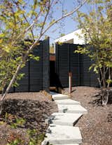 #outdoor #outside #exterior #modern #architecture #landscape #sebastianmariscalstudio #wabihouse #concrete #pads #frontdoor #aggregate #trees #wood