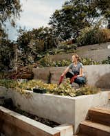 Outdoor, Back Yard, and Raised Planters Wakeland goes to work on the garden terraces where the couple grows much of their own food.  Search “where-the-sidewalk-ends.html” from Eric Garcetti's Green Home Remodel