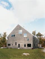 The Pine Plains, New York, home of Elise and Arnold Goodman boasts 48 windows, the largest of which measures 8'6'' by 7'6''. As architect Preston Scott Cohen explains, the "free facade makes it impossible to identify how many levels there are, or even to tell the difference between a door and a window." Photo by: Raimund Koch