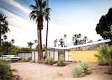Exterior, House, Mid-Century, and Butterfly A tract house with a butterfly roof designed in 1956 for Joe Dunas.  Exterior Butterfly Mid-Century Photos from Midcentury Lovers: You Can Thank This Architect for Transforming Palm Springs Into a Modernist Hotbed