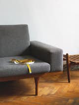 A 1959 teak-framed nine-foot-long SW 50-4 sofa by Illum Wikkelsø for the Danish furniture company Søren Willadsen sits pretty.