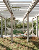 A second green roof is planted with sedum and plays host to one of the family’s favorite spots: a hammock. Bentheim suggested adding a trellis overhead to soften and balance the appearance of the facade.