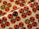 The Last Aphid woven upholstery, sourced from the Charley Harper archives and produced by Designtex, depicts four ladybugs poised to devour an aphid. The fabric, which can work for commercial interiors, is 71% Polyester (Postconsumer Recycled), 20% Nylon (Solution Dyed), 9% Polyester.