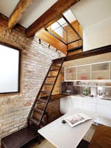 Tasked with transforming a 93-square-foot brick boiler room into a guesthouse, architect and metalworker Christi Azevedo flexed her creative muscle. The architect spent a year and a half designing and fabricating nearly everything in the structure save for the original brick walls. "I treated the interior like a custom piece of furniture," she says.