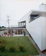 Grass, Back Yard, and Exterior In Montara, California, architect Michael Maltzan designed a home for, his sister and 

brother-in-law. From certain vantage points, the home’s unique angles result in M.C. Escher–like optical illusions.  Search “6 minor fixes help sell your home” from The Full Montara
