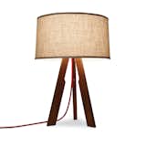 Solstice Table Lamp by Ample. Seattle company Ample pairs a linen shade with a solid walnut base and fabric-wrapped cord. The lamp measures 22 inches tall and 15 inches wide.