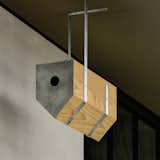 Jason David Smith, a young architect working for Levy at the time, made birdhouses for local screech owls and purple martins.