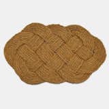Braided Doormat by Sailor Craft Knots. Hand braided from hemp and measuring 30 by 18 inches, the mat originates from Charleston, South Carolina.