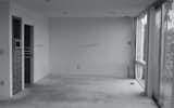 A wall used to separate the dining room from the kitchen.  Photo 9 of 15 in A Midcentury Home’s Past Mistakes Are Finally Corrected