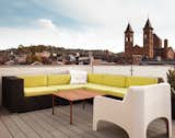 The roof deck, with views of the nearby St. Augustine church and beyond to downtown Pittsburgh, features partially recycled plastic decking from Rhino Deck and a custom galvanized-steel railing with frosted Plexiglas panels. “Pittsburgh’s one of those cities that if you grew up here, it has a draw that pulls you back,” Moss says.