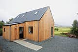 This "local prefab" home on the Isle of Skye is made mostly from materials sourced in northern Scotland. The timber-framed model, meant to evoke the simple agrarian barns of the area, can be constructed on-site in as little as a day and is designed for affordability.