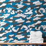 Camou by Ornamenta, $15 per square foot

An abstracted camouflage graphic adorns the porcelain tile. It’s rectified—meaning mechanically finished on all sides—to achieve uniformity and evenness.  Search “hallwayfloors--porcelain-tile” from Brilliantly Hued Surface Materials