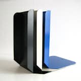 Book/Shop's heavy-duty bookends can hold up even the heftiest textbooks. 18-ounce steel sheets are bent then buffed to smooth rounded edges; they're available in three colors (shown here). $30 each at Book/Shop.