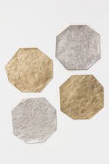 These geometric leather theorem coasters from Anthropologie are designed by Molly McGrath, whom finds inspiration from both urban and natural elements.  Search “map-trivets-and-coasters.html” from Behind-the-Scenes Party Essentials 