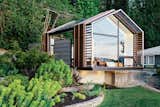 On Vashon Island, about 20 miles southwest of Seattle, architect Seth Grizzle designed a 440-square-foot multiuse structure for his clients Bill and Ruth True.