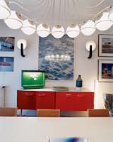 One of Krzentowski’s favorite pieces is the Gino Sarfatti 2109/16 ceiling lamp, which hangs above the dining room table.