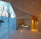 V-Lodge by Reiulf Ramstad Architects

A faceted roofed undulates throughout this private cabin by Reiulf Ramstad Architects in Buskerud, Norway. The firm is known for their attention to detail and impressive material sensibility.