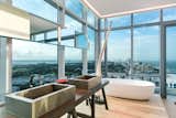 For those who can never get enough of a breathtaking view, the penthouse of the Setai in Miami Beach has it all. With floor-to-ceiling windows that create a graphic visual effect, this modern bathroom shows off sprawling ocean views.
