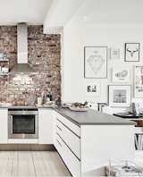 With an exposed brick wall and mesmerizing graphic art, this kitchen, posted by @abigailclaireinspo, feels particularly on-trend.  Photo 10 of 19 in exposed brick by Kate Reggev from Spotted on Instagram: Five Totally Different Styles for Your Kitchen