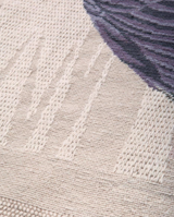 A detail of the intense needlepoint technique, which references both tapestry and embroidered clothing production methodology, particularly that of traditional Portuguese rug production found in Arraiolos, located in the Evora region of the country.