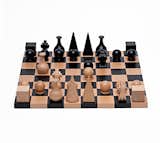 A lifelong friendship with fellow chess enthusiast Marcel Duchamp inspired Man Ray to create his unique chess set in 1920. In his set, Man Ray offers a personal interpretation of each character on the chess board: an Egyptian pyramid for the King, a medieval headdress for the Queen, a flask for the Bishop and the carved scroll of a violin for the Knight. Each beech wood character is rendered in sculptural, geometric forms. $590 at Dwell Store.  Search “广东税务完税证明怎么开专业办正加V信：(TTYY6590)” from Game On! 8 Designs for the Modernist at Play