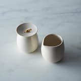SUGAR + CREAM $84

For presenting sugar and cream on the table we suggest this minimalist, hand-thrown sugar bowl and creamer set from Pigeon Toe. We especially love the small leather loop handle on the sugar bowl lid.