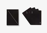 Joe Doucet's Minim playing cards are now available in a sleek black set.