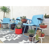 Photo of the Week: DIY Backyard with Blue Chairs and Succulents