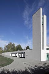The Chapel of St. Lawrence by Avanto Architects, which opened in 2010, is set in a historic site in Vantaa, Finland. The new building links the town's old medieval stone church and bellcote to a new, modern volume.
