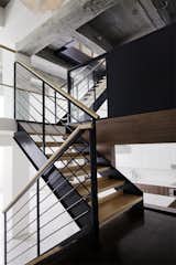The switchback stairs create a circulation pattern that, according to Bangia, is "noticeably different than what you would find in a typical Brooklyn town house." She adds, "It lends an element of surprise when moving between floors, and a dynamic spatial sense of expansion and contraction.”