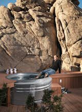 Nighttime hikes often end at the the “cowboy” hot tub where Smith soaks his feet: two nested Hastings galvanized livestock feeders. The tub is surrounded by a Veranda faux-wood deck and fed with hot water from the house’s solar hot-water system.