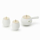 A spot of tea becomes a playful tabletop game in this set from Nendo. After your brew steeps, remove the pot's wooden lid, which doubles as a spinning top.