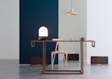 The studio's Vinge table lamp lights up the space.