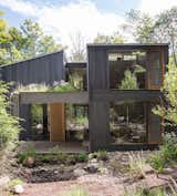 Exterior, House Building Type, and Wood Siding Material In upstate New York, two families unite to design a vacation house that will suit all their needs for years to come.  Photo 4 of 5 in A Dream Home is an Architectural Self-Portrait