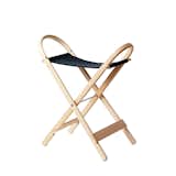 Folding Stool X by Åke Axelsson

Strips of beech wood are steam-bent to create the stool’s frame, which folds flat when not in use. The canvas seat comes in blue, black, and off-white.