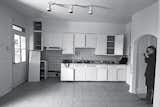 The apartment originally crammed four closed rooms and a kitchen and bathroom into 1,000 square feet. After the renovation, it had only one bedroom and a large, open kitchen.