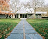 Eero Saarinen’s legendary Miller House opened to the public in May 2011 for the first time. The pathway from the pool to the house is paved with the same slate that clads the exterior walls. Photo by Leslie Williamson.