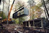 Exterior, House Building Type, Cabin Building Type, Prefab Building Type, Metal Roof Material, Metal Siding Material, and Glass Siding Material It takes three to five days to install a Vipp Shelter onsite.  Photos from Prefab Gets a Makeover With Danish Industrial Design 