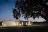Exterior, House Building Type, and Flat RoofLine On an agricultural estate in Portugal, blaanc studio designed a simple retreat that does its utmost not to interfer with the scenic backdrop.  Search “dwell west side meet architects night” from This Vineyard Hideout Is One with the Land, Literally